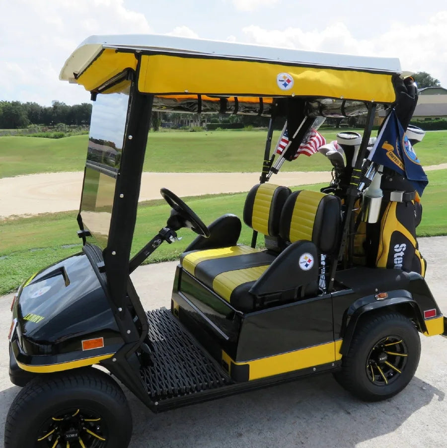 Customer golf cart featuring customized black and yellow Cart Buddy armrest covers